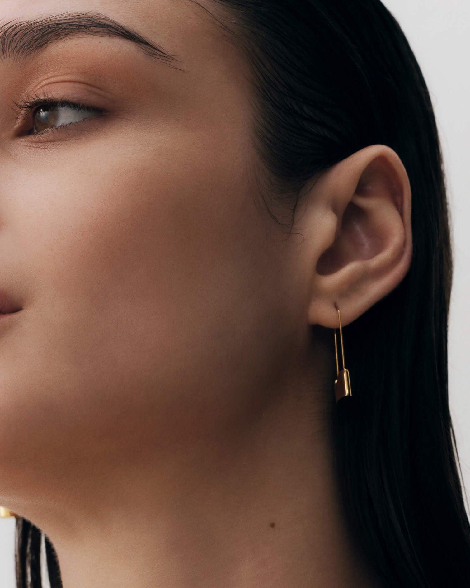 Lock pin earrings