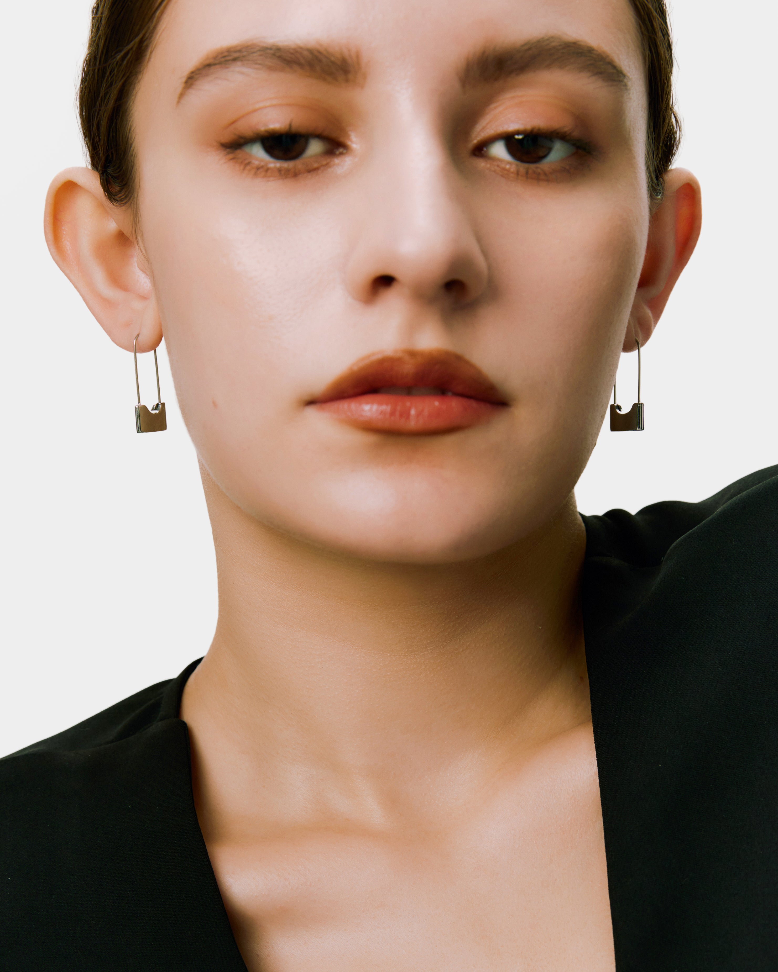 Lock pin earrings