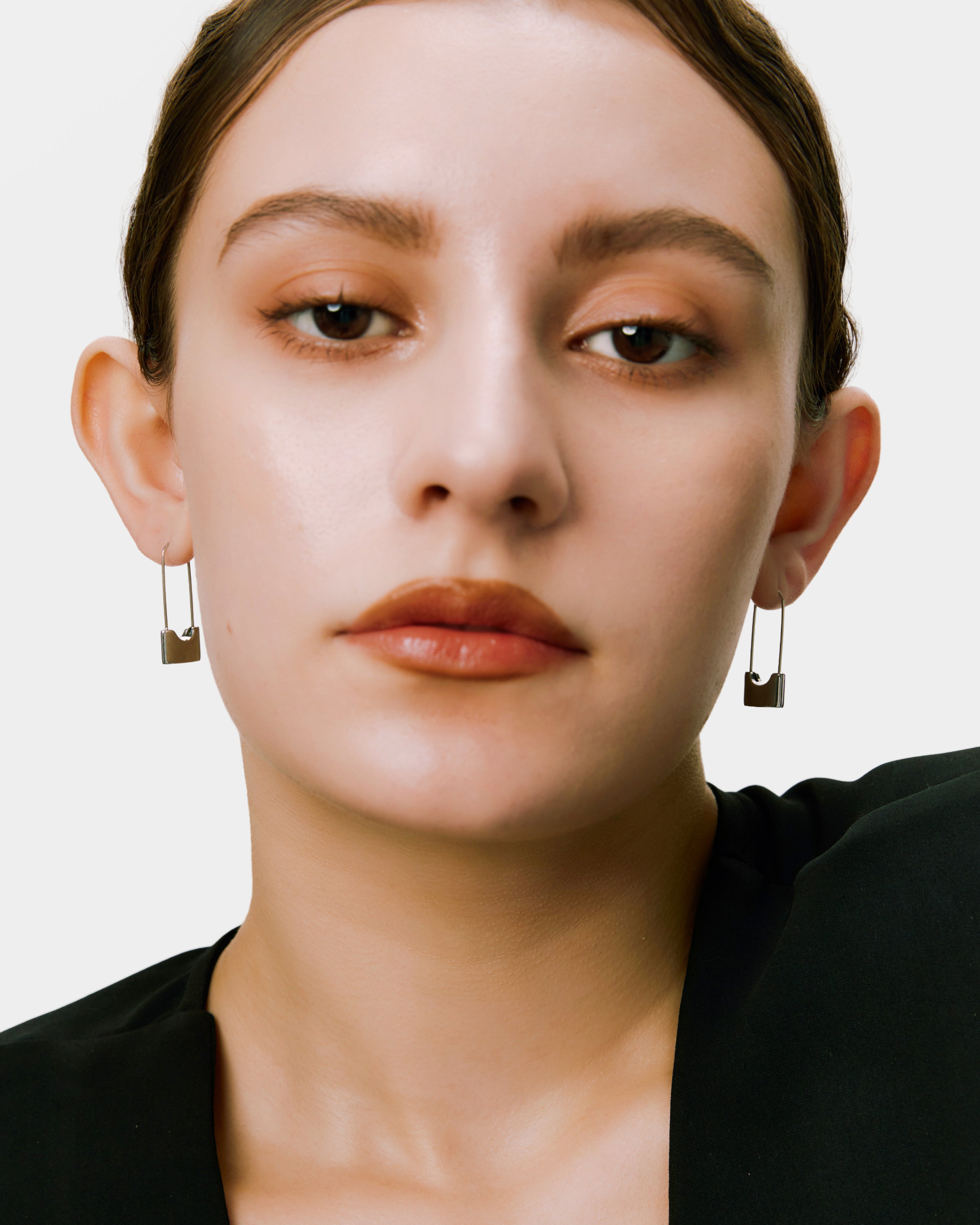 Lock pin earrings