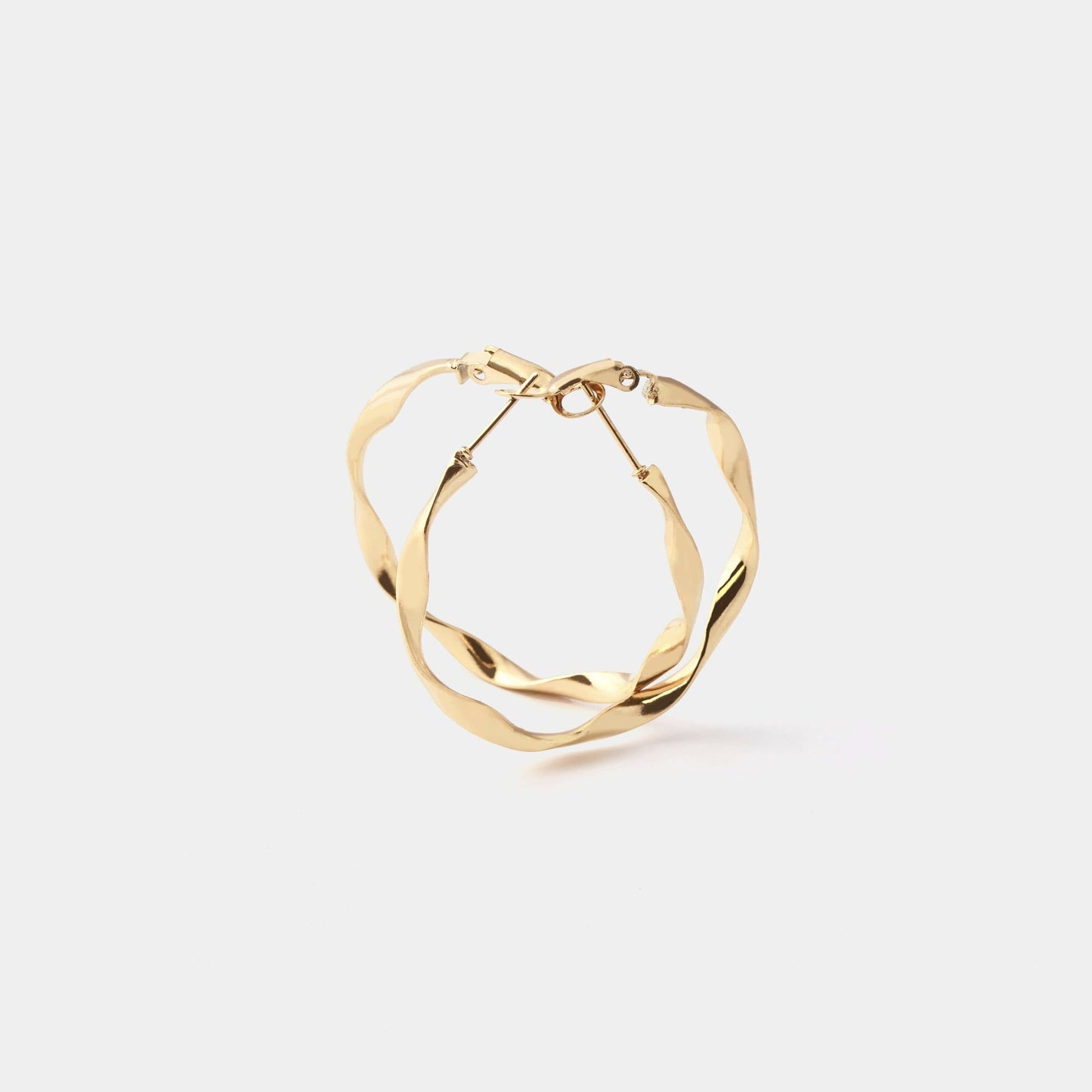 
                  
                    SPIRAL FLAT HOOP PIERCE
                  
                