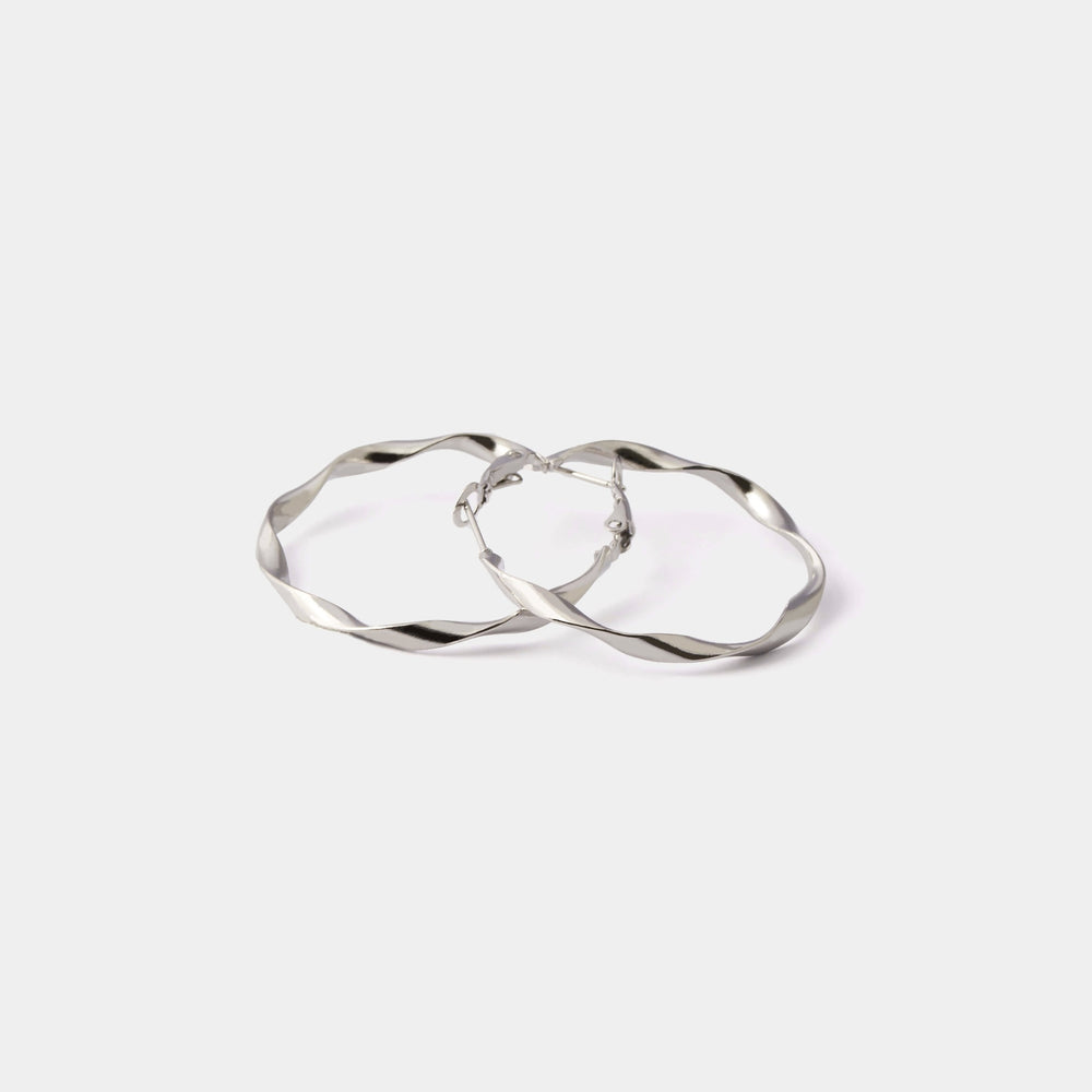 
                  
                    SPIRAL FLAT HOOP PIERCE
                  
                