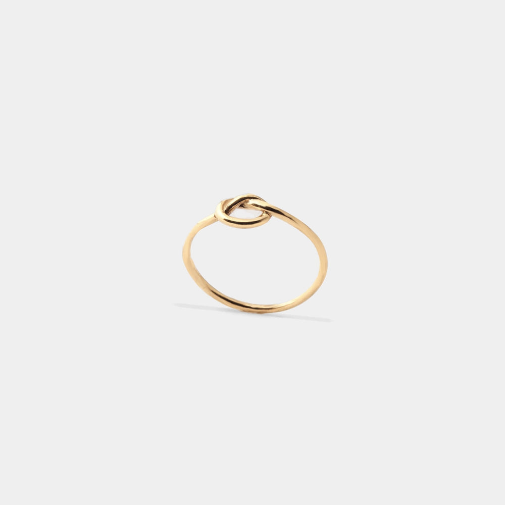 
                  
                    SLIM KNOT RING
                  
                