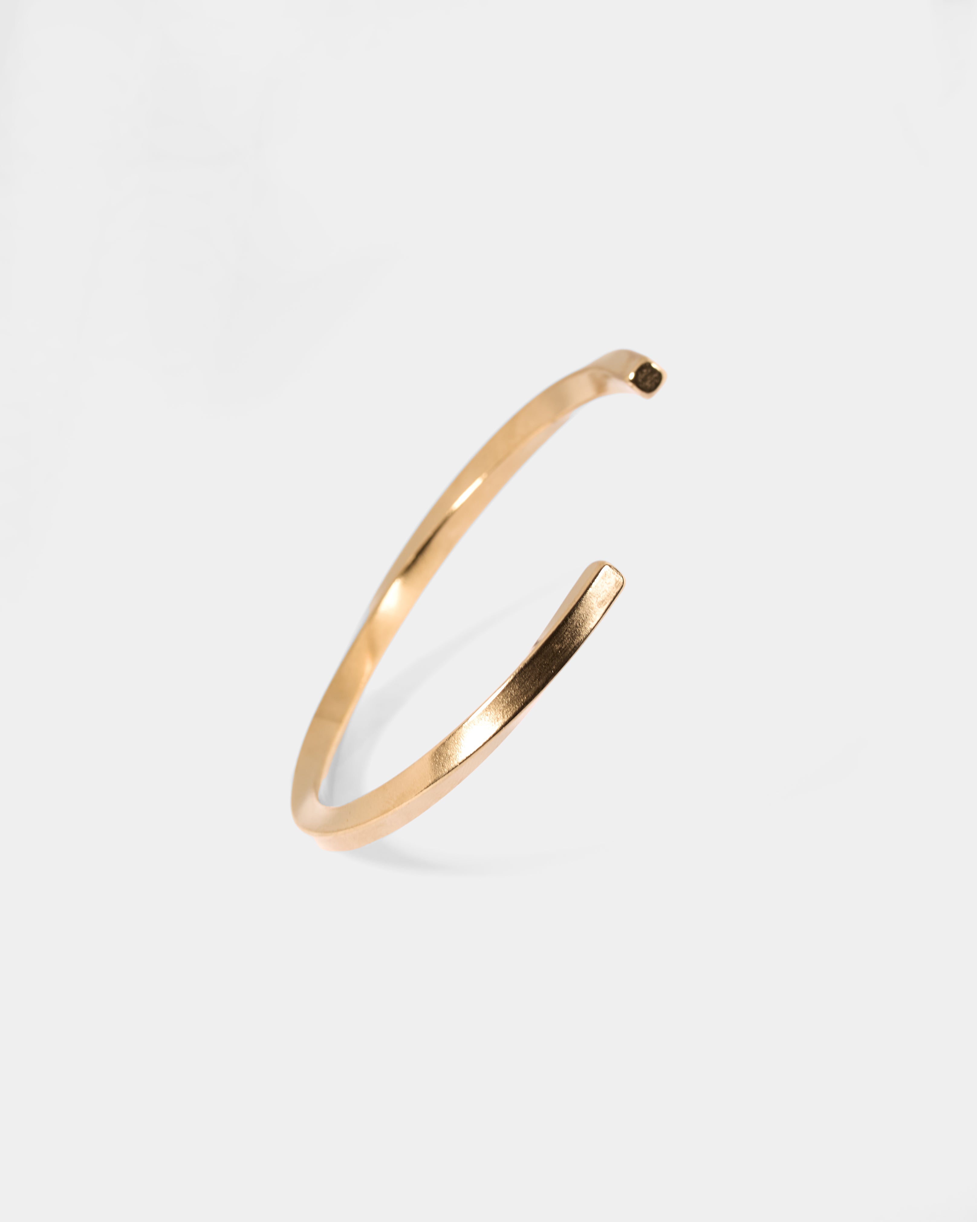 TWIST OPEN BANGLE